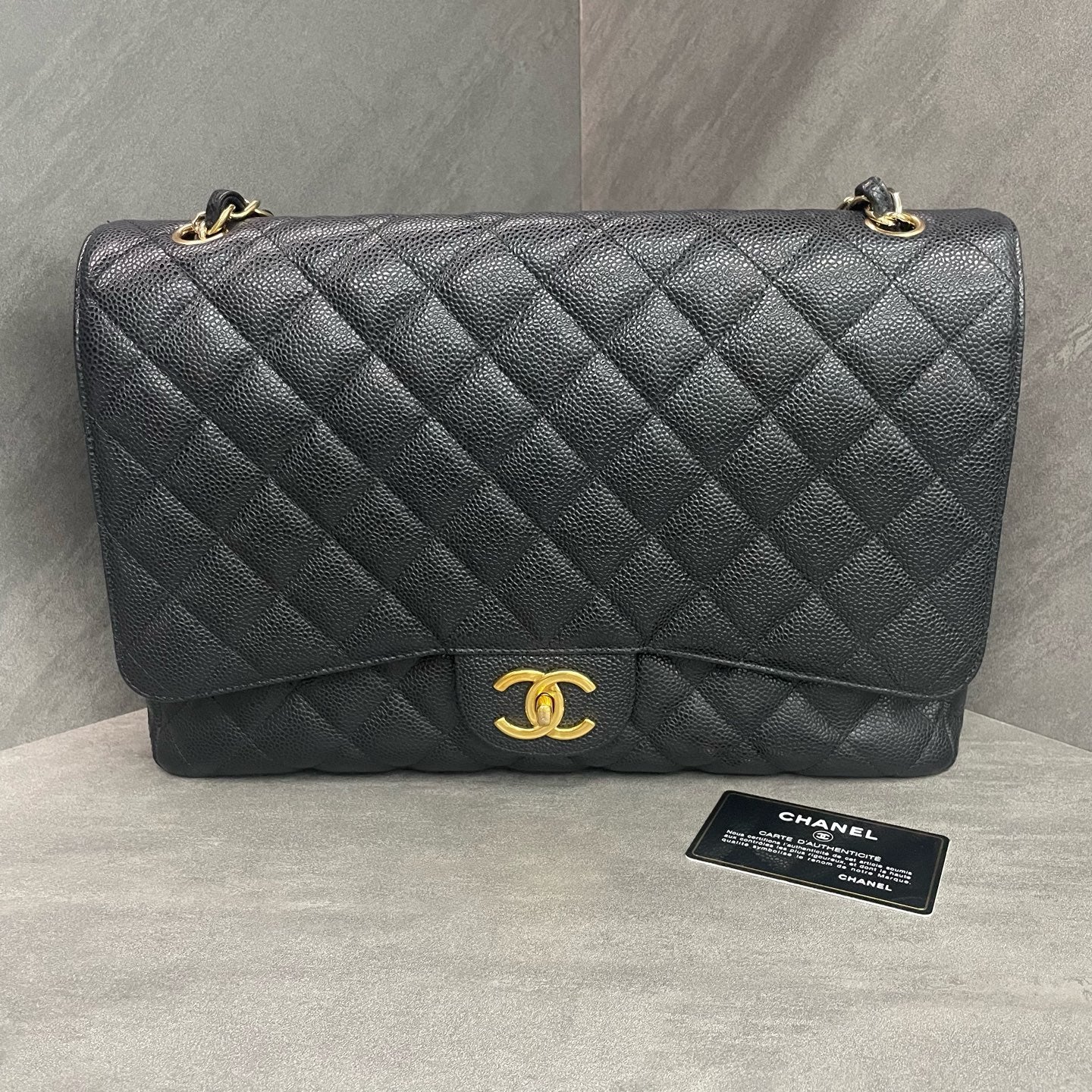 Chanel Classic Flap  lichee pattern cowhide Maxi Black-Gold